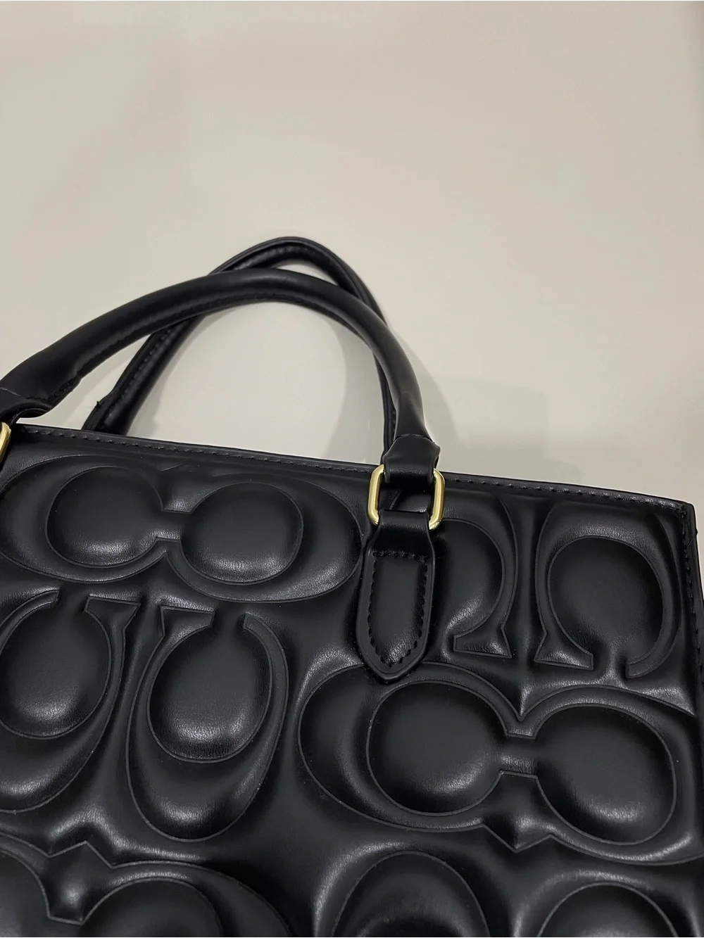 Coach Black Signature Embossed Leather Tote with Cherry Charm